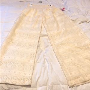 Cream, high waisted sheer leg fun pants!